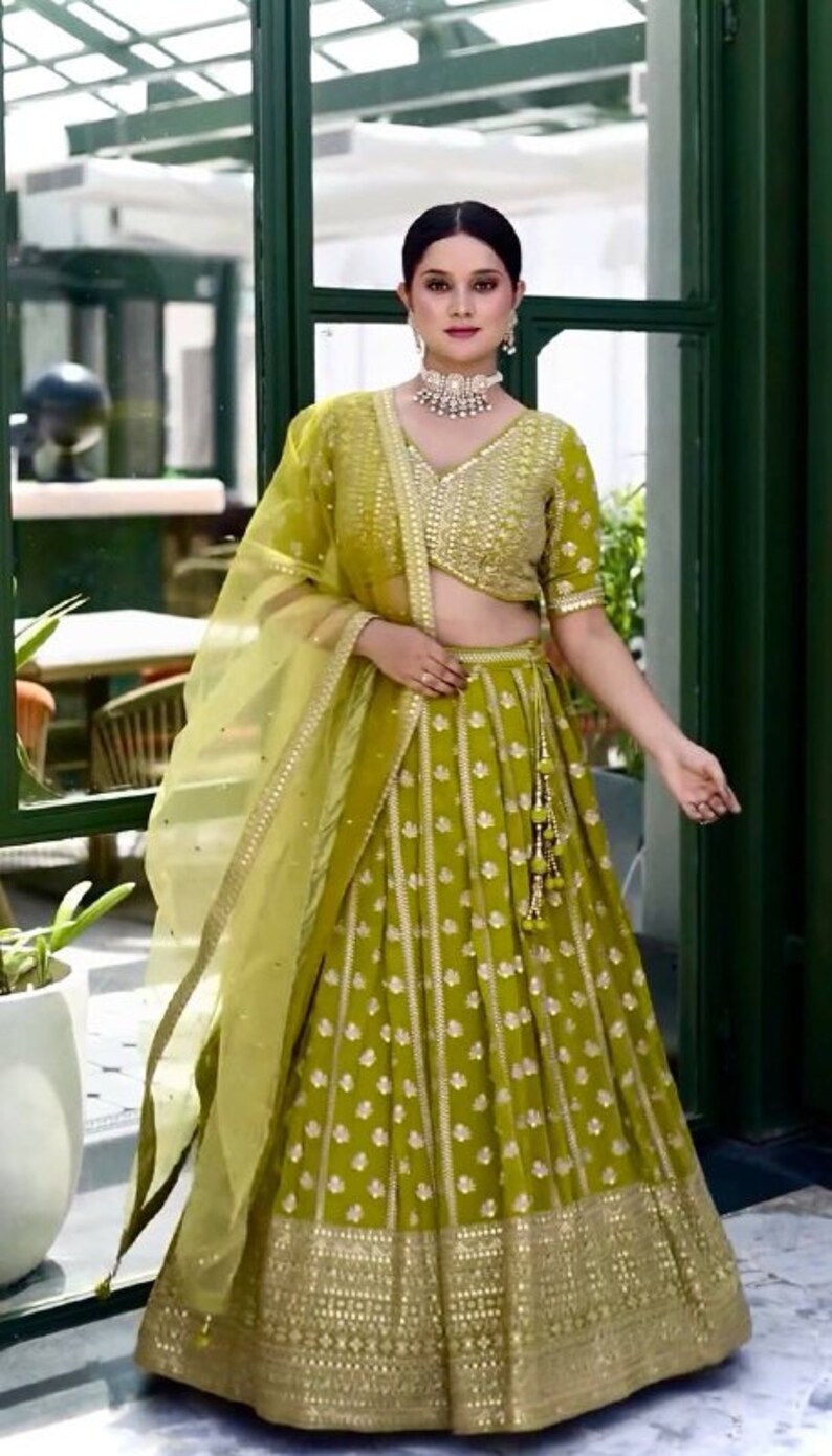 Green lehenga set for bride and bridesmaids for Mehandi, wedding party